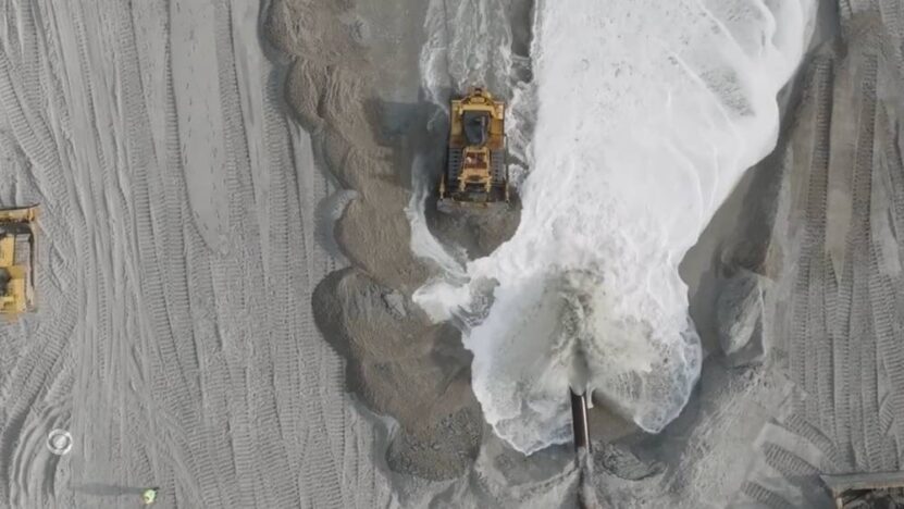 Restoring beach with heavy machinery
